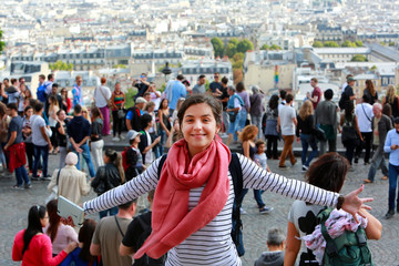 Happy beautiful girl on Montmartre in Paris