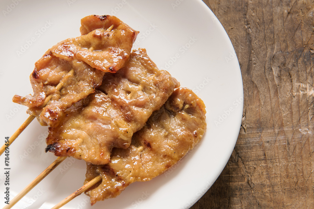 Grilled pork and sticky rice on plate, Thai food style Grilled pork and sticky rice on plate, Thai food style