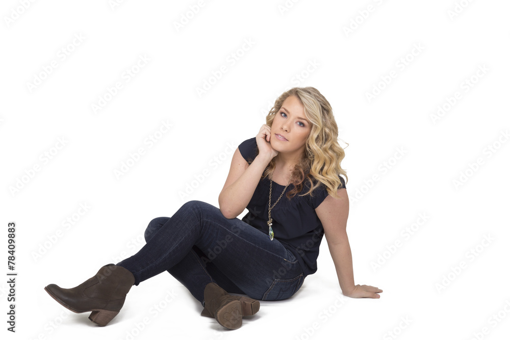 Fototapeta premium Beautiful young woman in late teens or early twenties isolated