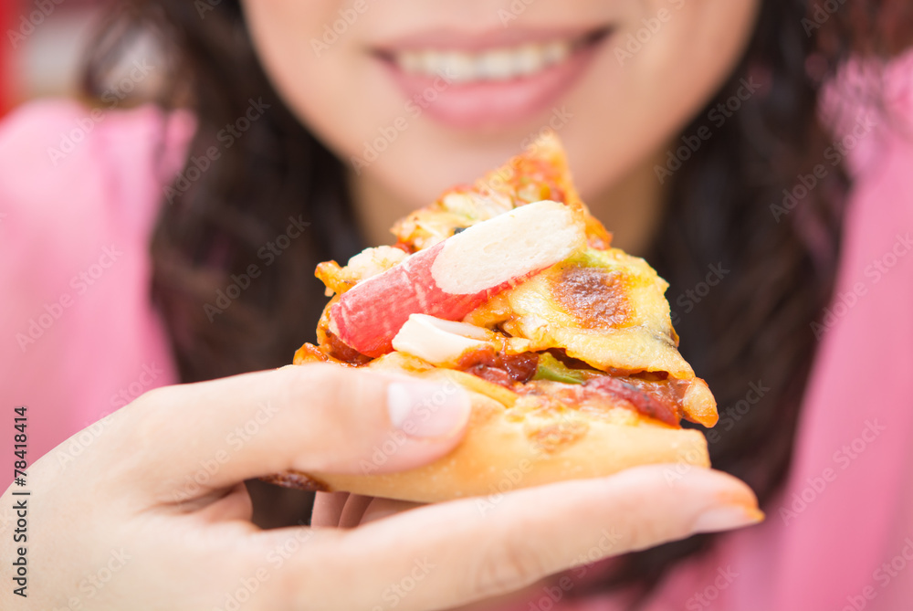 woman eating pizza. Healthy and junk food concept. woman eating pizza. Healthy and junk food concept.