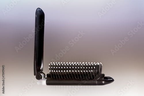 Black hairbrush with white tips