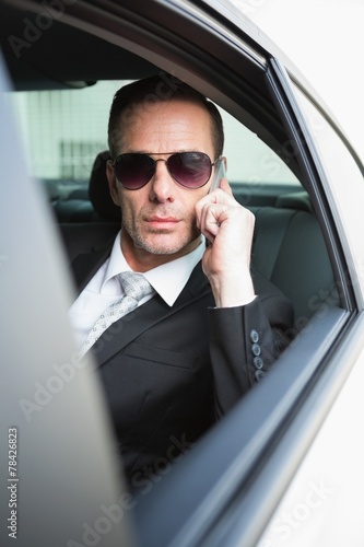 Businessman on the phone wearing sunglasses © WavebreakMediaMicro