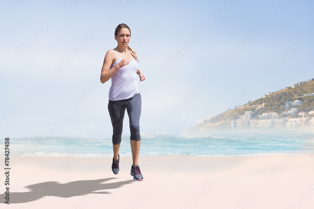 Composite image of focused fit blonde jogging
