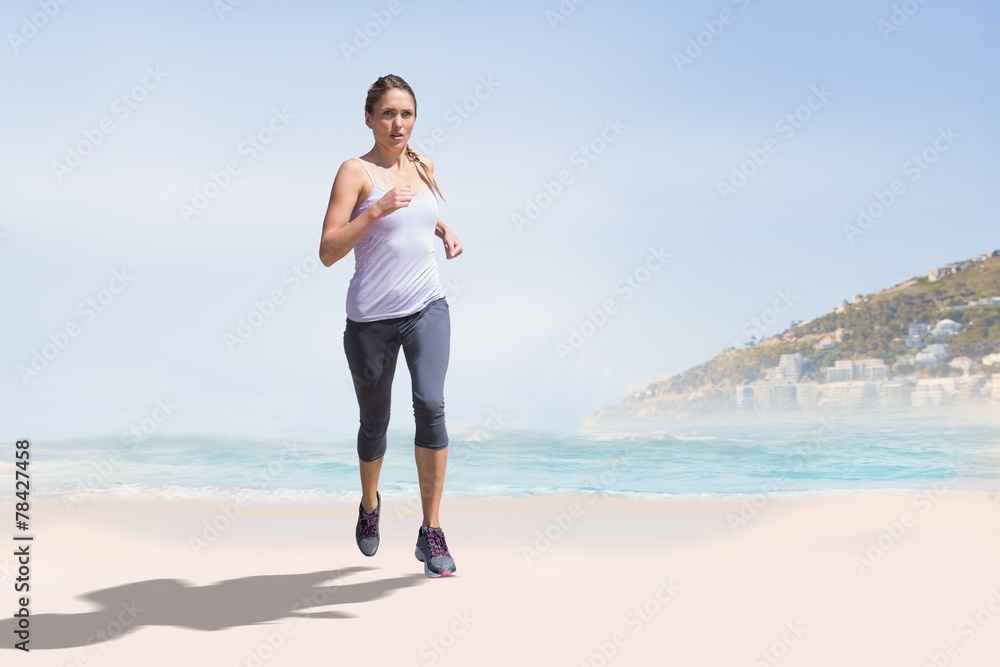 Composite image of focused fit blonde jogging Composite image of focused fit blonde jogging