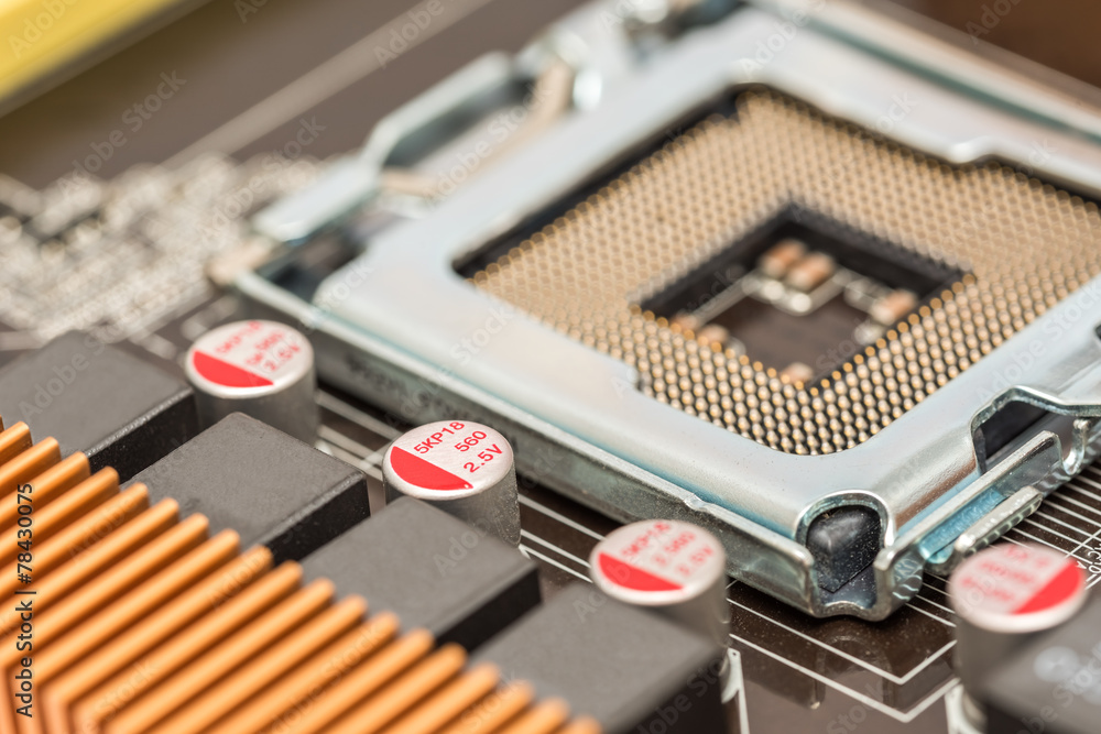 CPU Socket And Capacitors On Computer Motherboard CPU Socket And Capacitors On Computer Motherboard