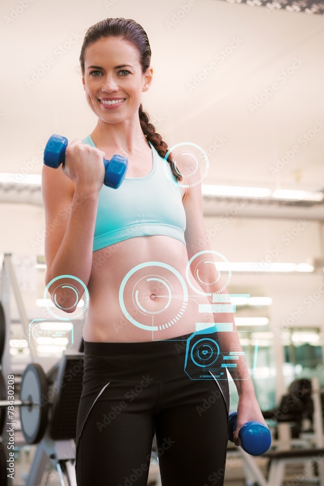 Composite image of fit smiling brunette lifting blue dumbbells Composite image of fit smiling brunette lifting blue dumbbells