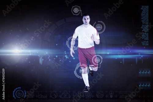 Composite image of football player in white jogging