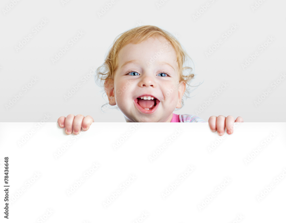 Baby boy showing blank placard with copy space. Baby boy showing blank placard with copy space.
