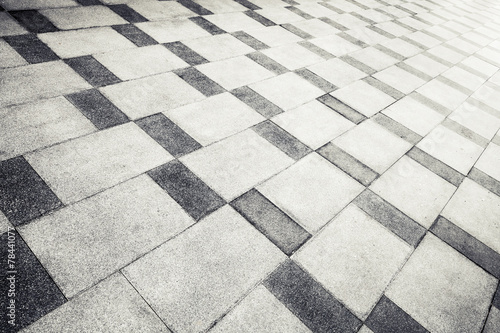 Gray concrete tiling with abstract pattern  urban pavement