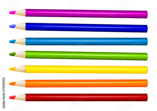 Seven color pencils in arrange in color row on white background