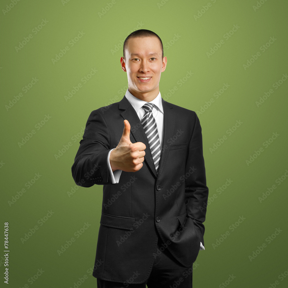 asian businessman in black suit shows well done asian businessman in black suit shows well done