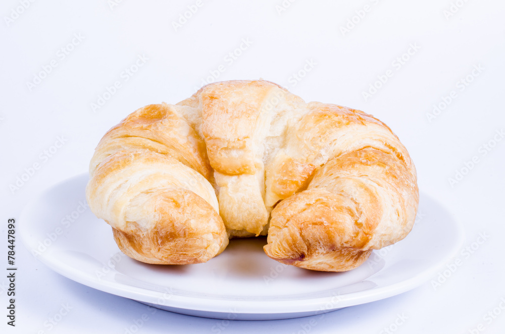 croissant on white dish