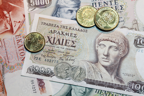 old greek drachmes banknotes and coins photo
