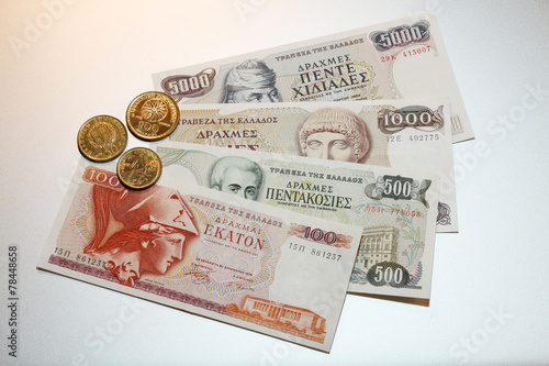 greek drachmes banknotes and coins photo