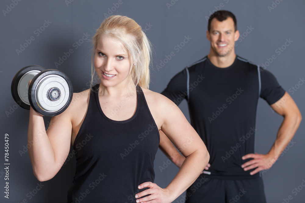 Fitness Team with a bar bell Fitness Team with a bar bell