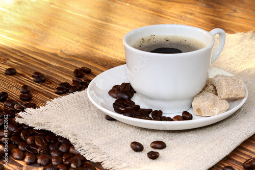 Cup of coffee with cane sugar