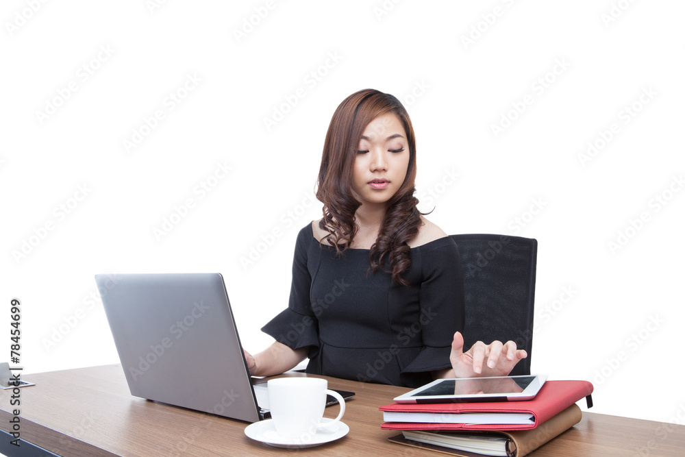Businesswoman reading latest news on tablet Businesswoman reading latest news on tablet