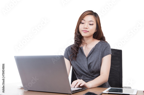Businesswoman using laptop