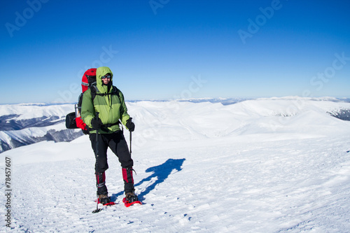 Winter hiking in snowshoes.