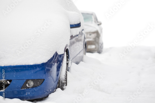 cars covered with snow