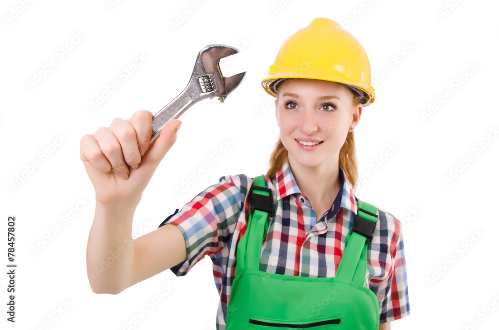 Constructon worker female with wrench isolated on white Constructon worker female with wrench isolated on white