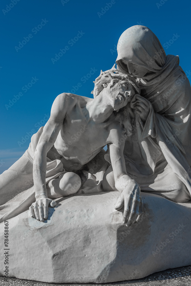 Naklejka premium Statue of Jesus Christ and Maria at church of Notre Dame de la G