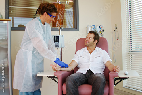 Chemo nurse and patient smiling