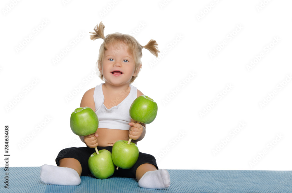 Smiling girl with weights of green apples Smiling girl with weights of green apples