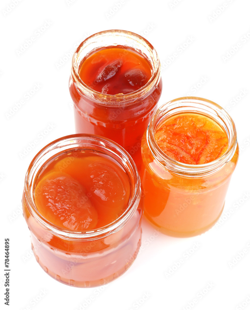 Homemade jars of fruits jam isolated on white background Homemade jars of fruits jam isolated on white background