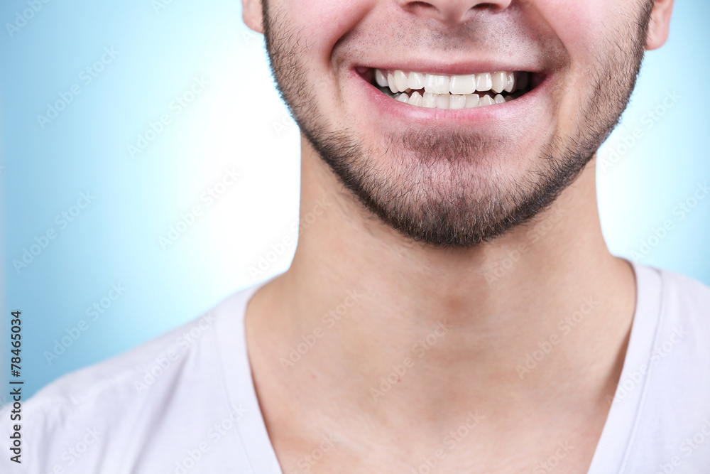 Fototapeta premium Smiling young man after visit dentist