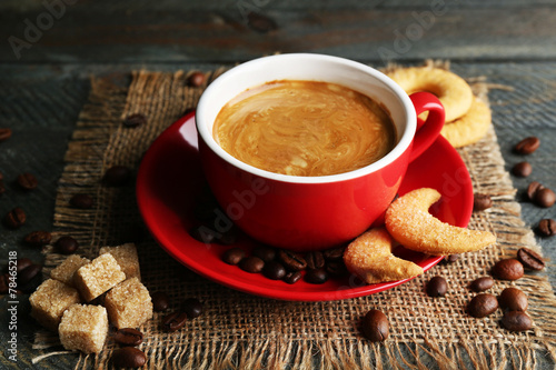 Cup of coffee and tasty cookies