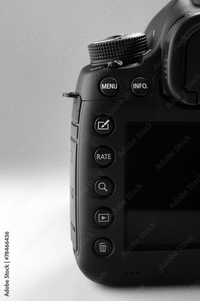 Digital camera on gray background