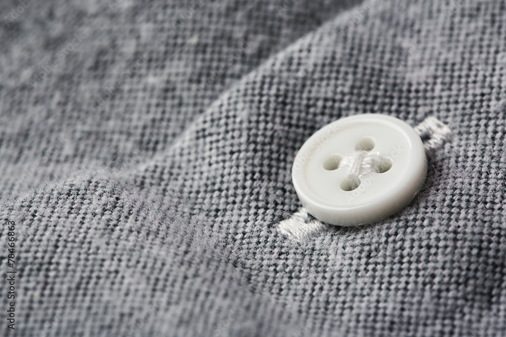 Button on clothes close up Button on clothes close up