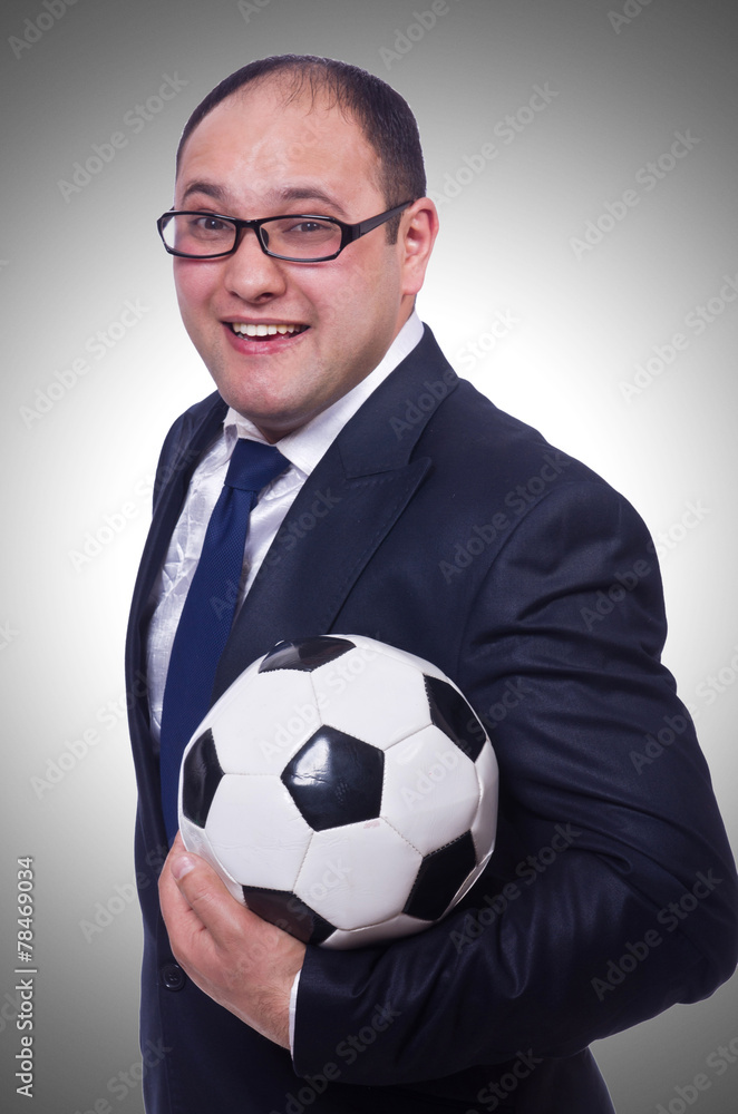 Businessman with football on white Businessman with football on white