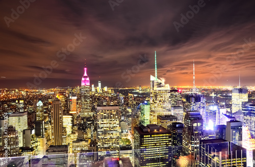 View of New York night with cloudy sky.