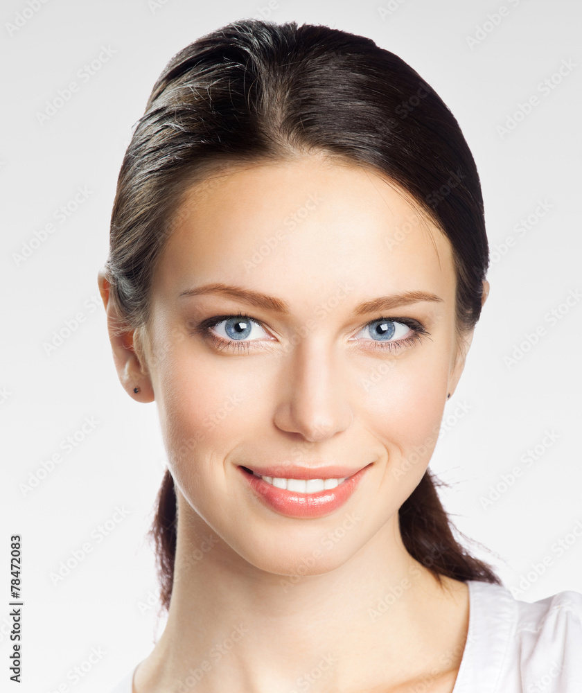 Happy smiling businesswoman, on grey Happy smiling businesswoman, on grey
