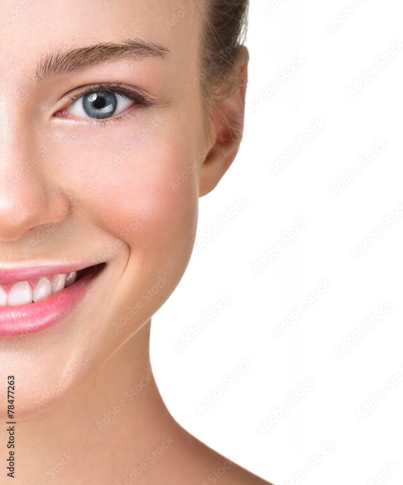 Obraz premium Beautiful woman with white teeth. Attractive sincere smile. Clea