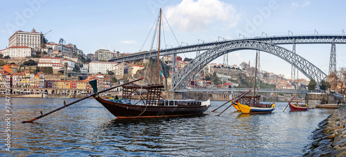 The Rabelo Boats and the Dom Luis I Bridge. Porto, Portugal photo
