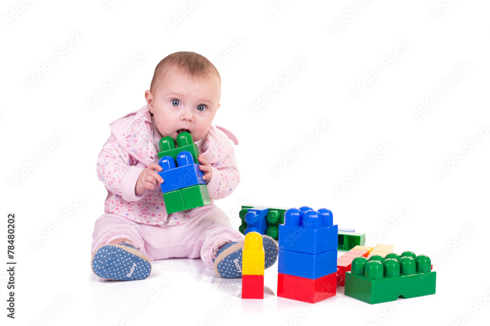 child boy playing with block toys over white background child boy playing with block toys over white background