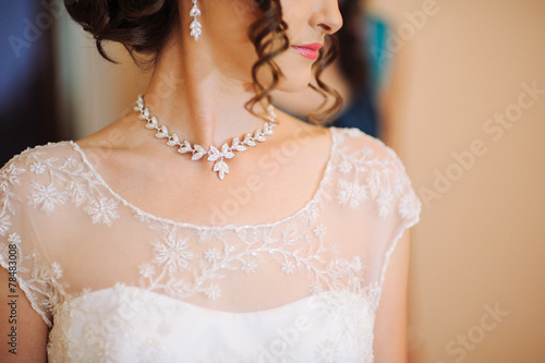 a woman's neck line on her wedding day.