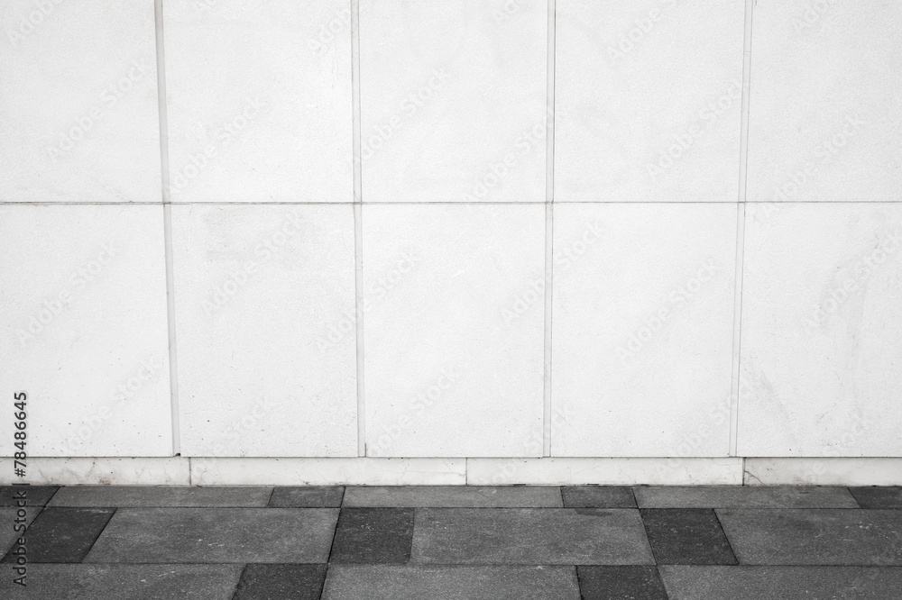 Urban background interior with white tiling on wall