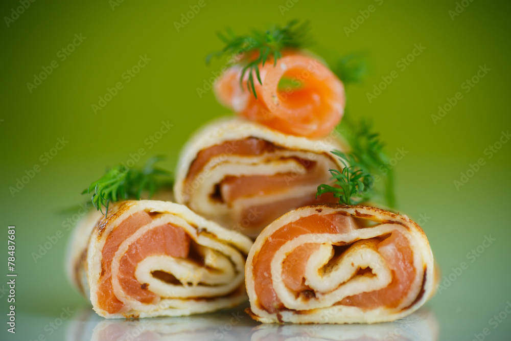 rolls of thin pancakes with salted red fish rolls of thin pancakes with salted red fish