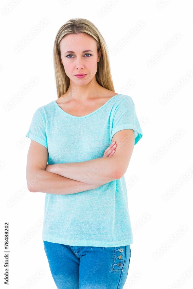Serious blond posing with arms crossed Serious blond posing with arms crossed