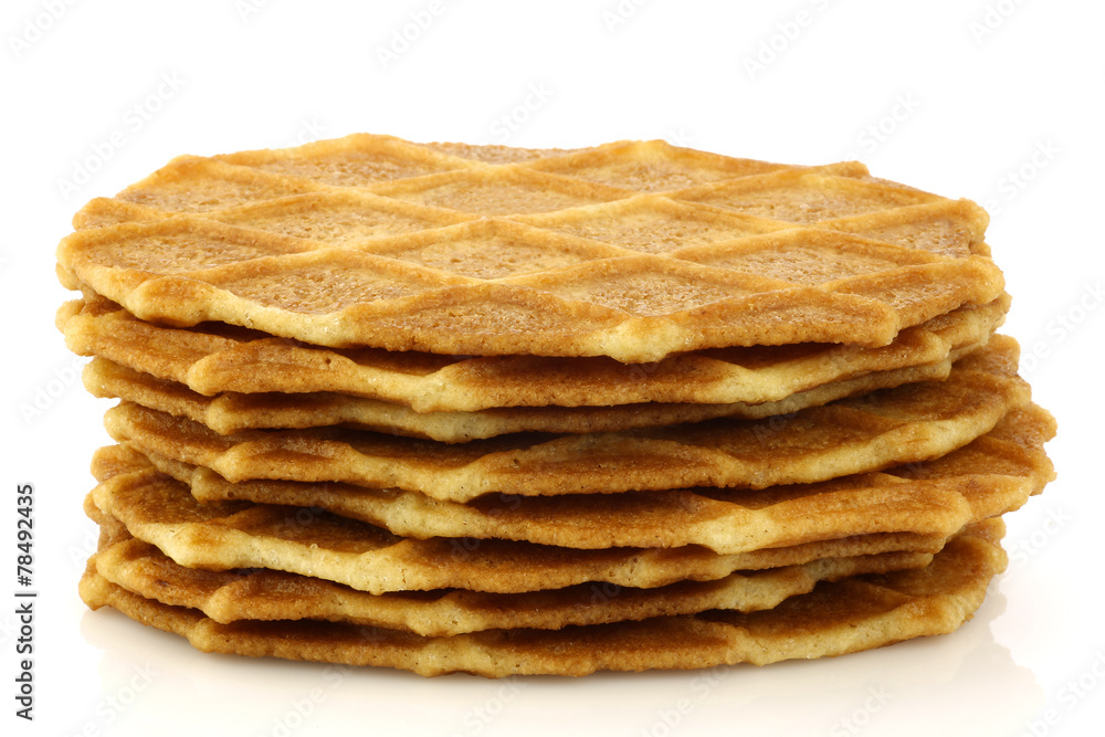 freshly baked stacked Dutch waffles on a white background freshly baked stacked Dutch waffles on a white background