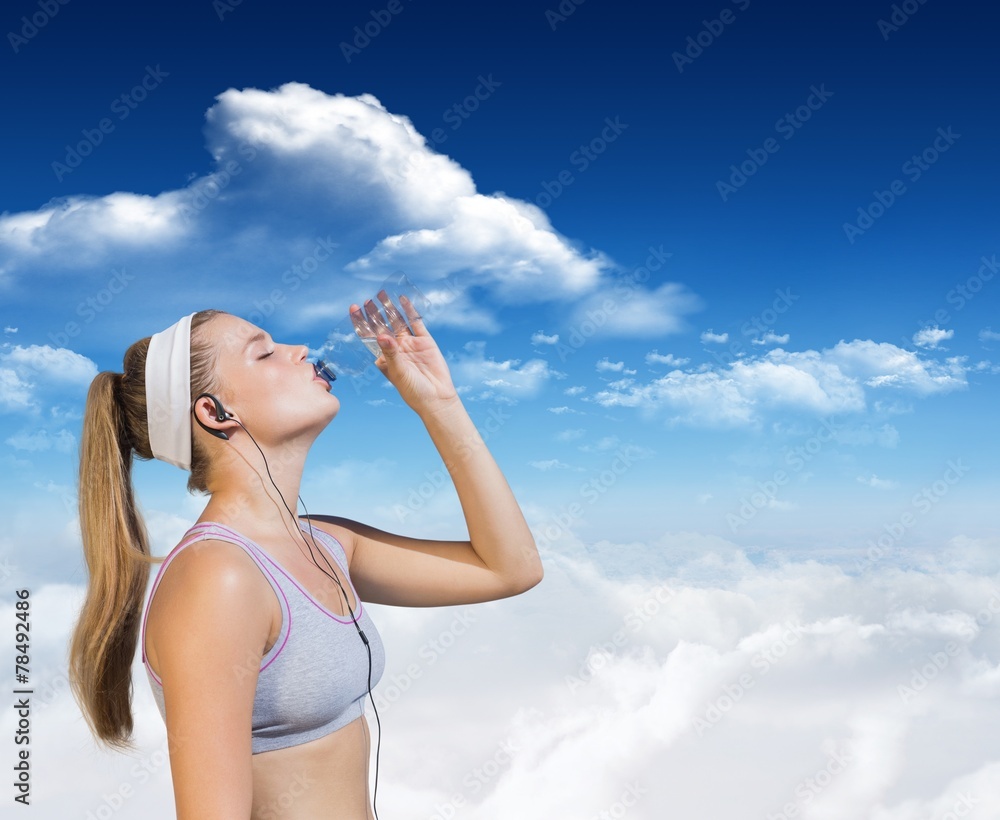 Composite image of sporty blonde drinking water Composite image of sporty blonde drinking water
