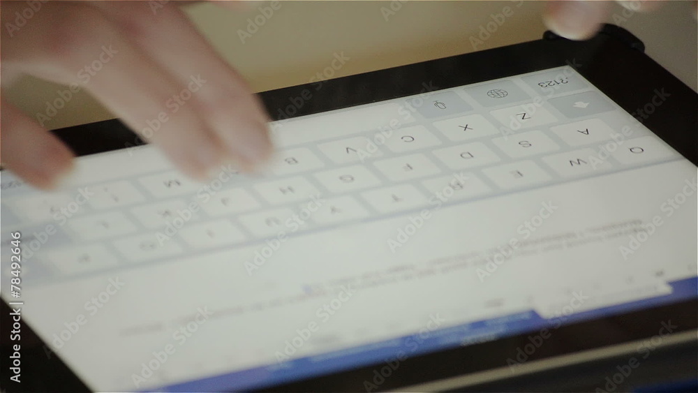 Woman writes a letter to the virtual keyboard Woman writes a letter to the virtual keyboard