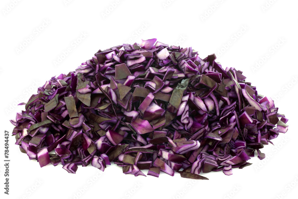 heap of freshly cut red cabbage pieces  on a white background