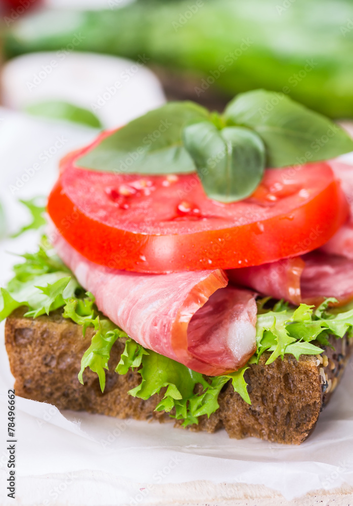 Sandwich with ham and vegetables