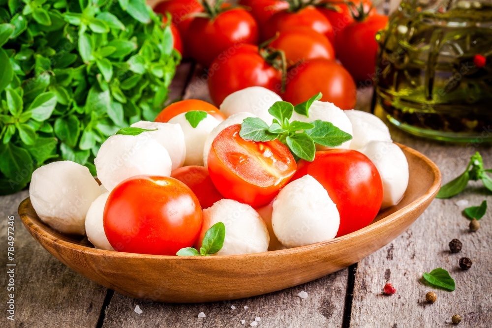mozzarella, organic cherry tomatoes, fresh basil and olive oil mozzarella, organic cherry tomatoes, fresh basil and olive oil
