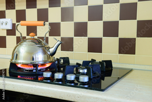 Kettle basking in the modern gas stove